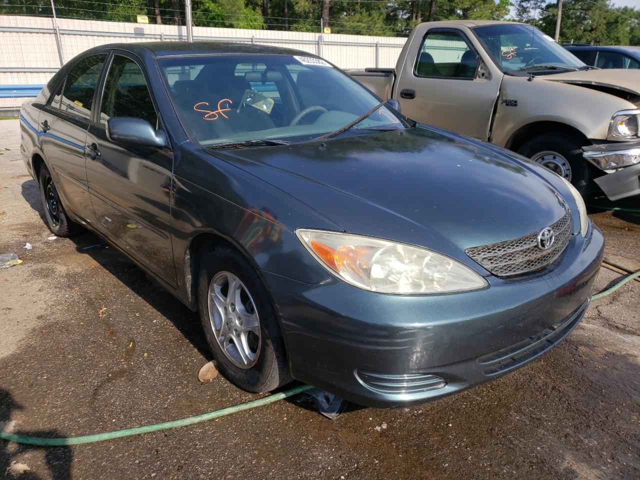 TOYOTA CAMRY LE 2002 with VIN 4T1BE32K02U530485 - Photo from auction