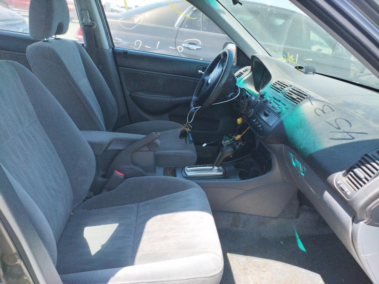 Photo 5 from auction – 2004 HONDA CIVIC LX with VIN 2HGES16564H501387