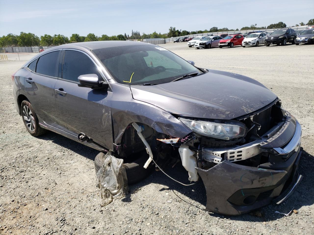 HONDA CIVIC EX 2017 with VIN 19XFC2F73HE216994 - Photo from auction