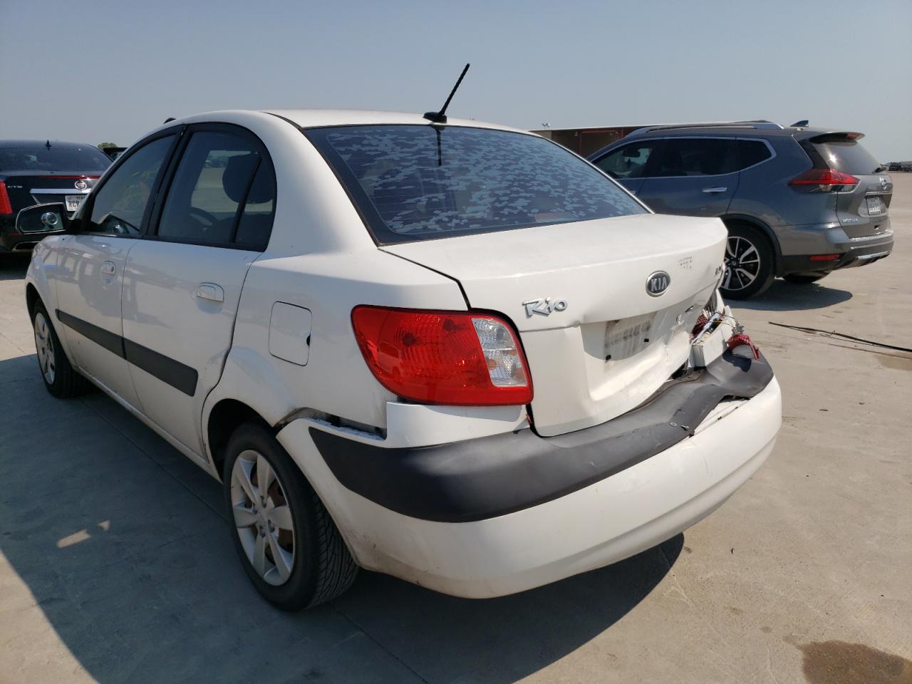 Photo 3 from auction – 2009 KIA RIO BASE with VIN KNADE223696583137