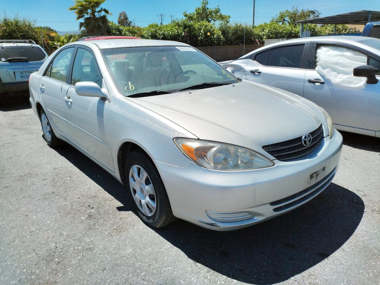 TOYOTA CAMRY LE 2003 with VIN 4T1BE32K33U699627 - Photo from auction