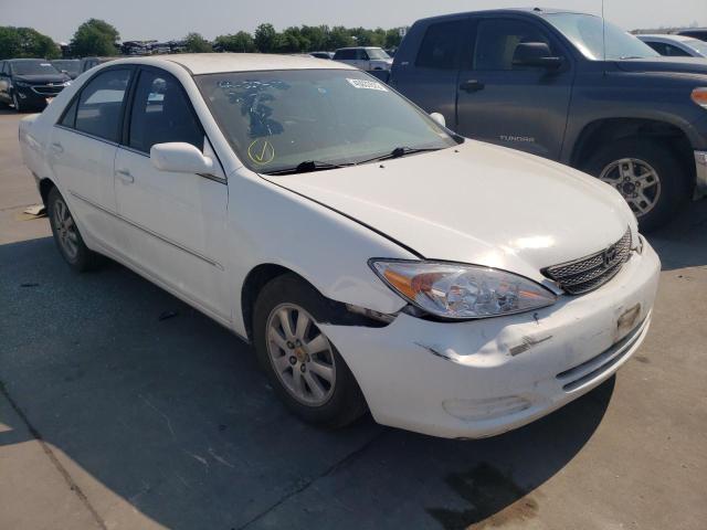 TOYOTA CAMRY LE 2002 with VIN 4T1BE32K72U071648 - Photo from auction