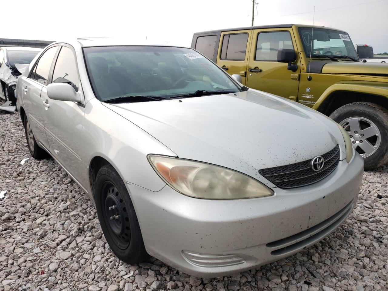 TOYOTA CAMRY LE 2002 with VIN 4T1BE32K32U034693 - Photo from auction