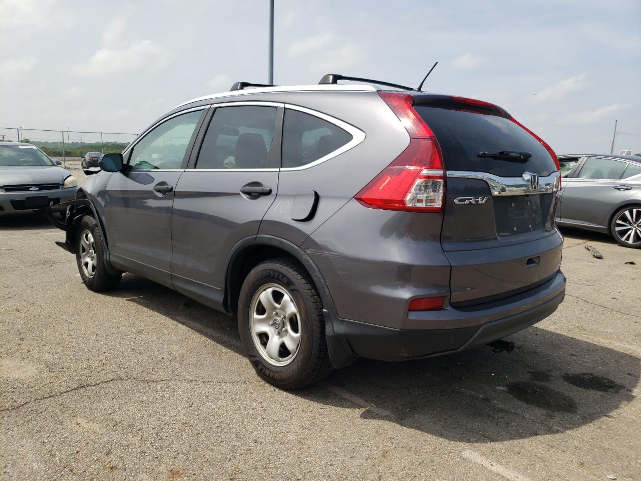 Photo 3 from auction – 2015 HONDA CR-V LX with VIN 5J6RM4H31FL077379