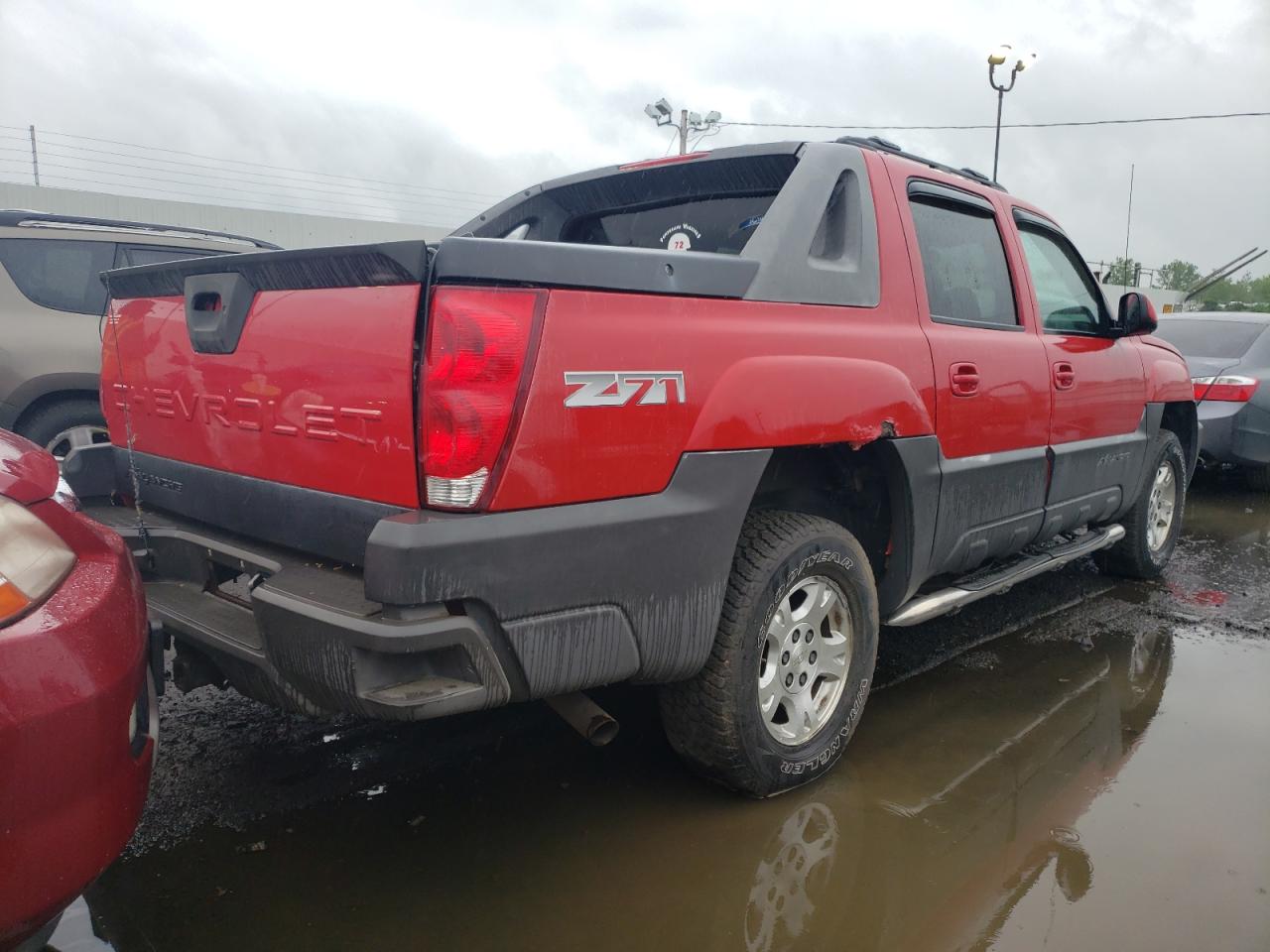 Photo 4 from auction – 2004 CHEVROLET AVALANCHE with VIN 3GNEK12T44G309914