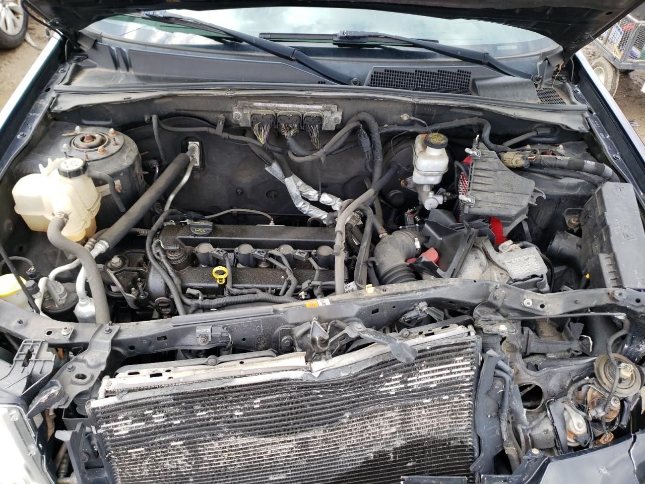 Foto 7 de la subasta – 2010 FORD ESCAPE LIM con VIN 1FMCU0E75AKA29535