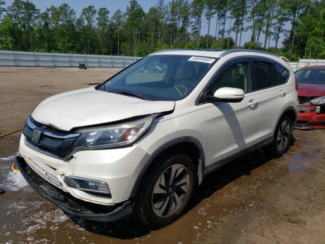 Photo 2 from auction – 2016 HONDA CR-V TOURI with VIN 5J6RM3H95GL007710