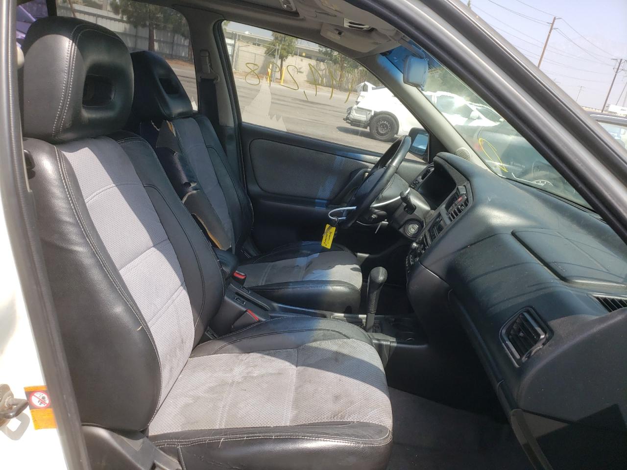 Photo 5 from auction – 2002 INFINITI G20 with VIN JNKCP11A62T504784