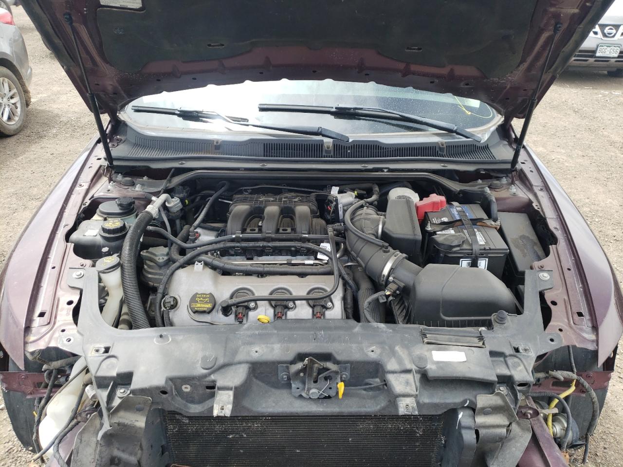 Photo 7 from auction – 2011 FORD TAURUS LIM with VIN 1FAHP2FW3BG170083