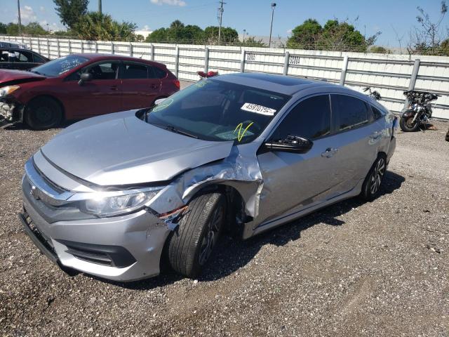Photo 2 from auction – 2018 HONDA CIVIC EX with VIN 19XFC2F76JE025222