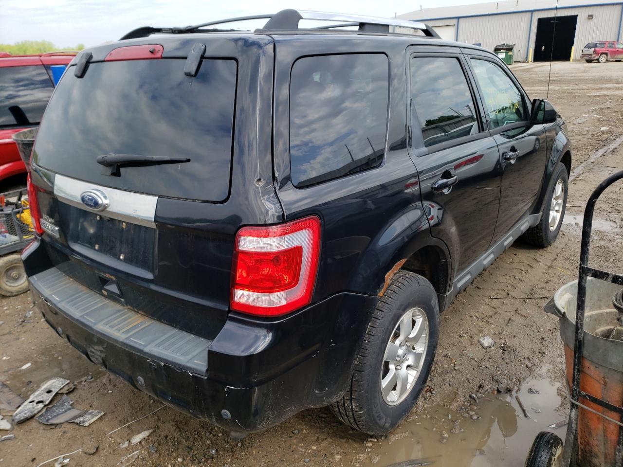 Photo 4 from auction – 2010 FORD ESCAPE LIM with VIN 1FMCU0E75AKA29535