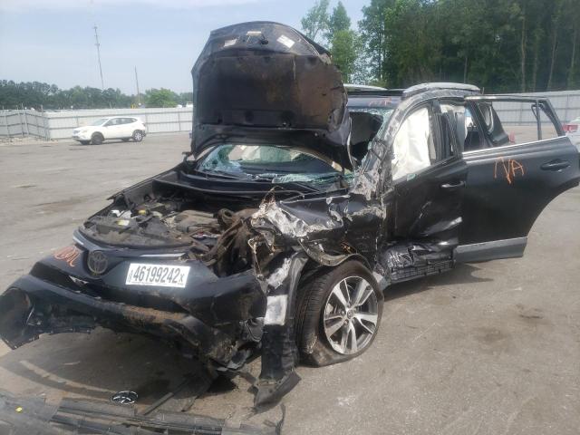 Photo 2 from auction – 2016 TOYOTA RAV4 XLE with VIN 2T3WFREV9GW246455