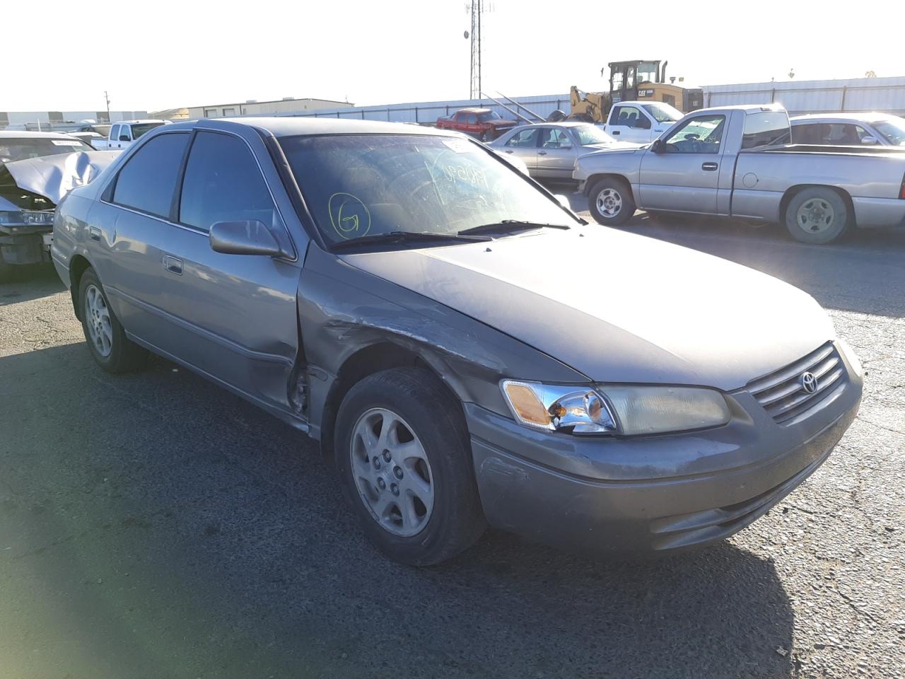 TOYOTA CAMRY LE 1999 with VIN JT2BF22K2X0178058 - Photo from auction