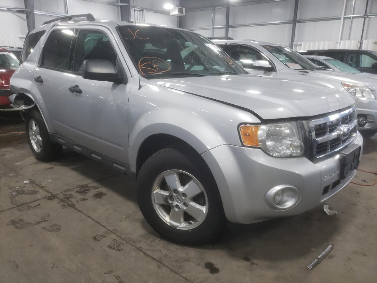 FORD ESCAPE XLT 2011 with VIN 1FMCU0DG0BKA94067 - Photo from auction