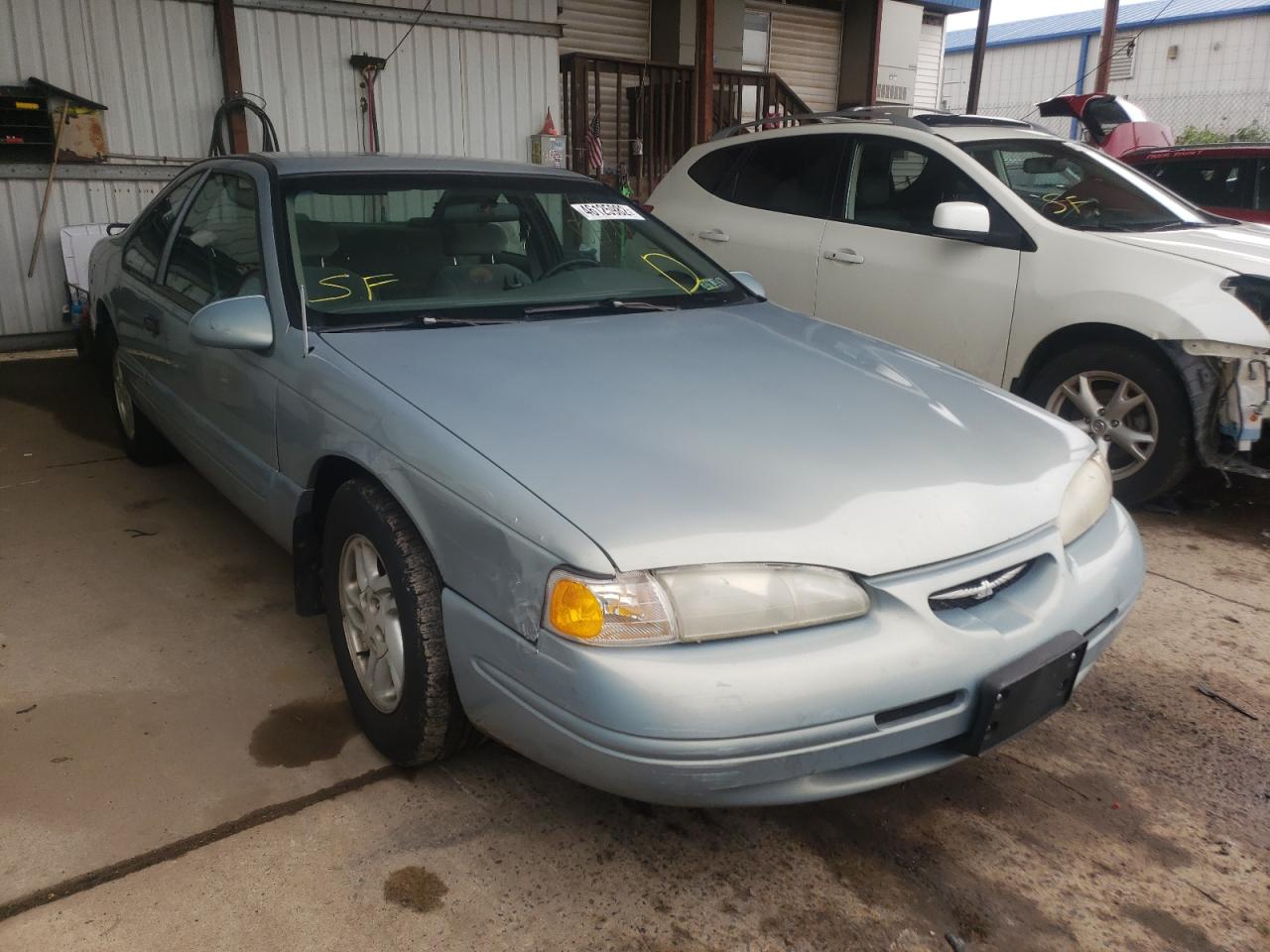 FORD THUNDERBIR 1997 with VIN 1FALP6249VH148979 - Photo from auction