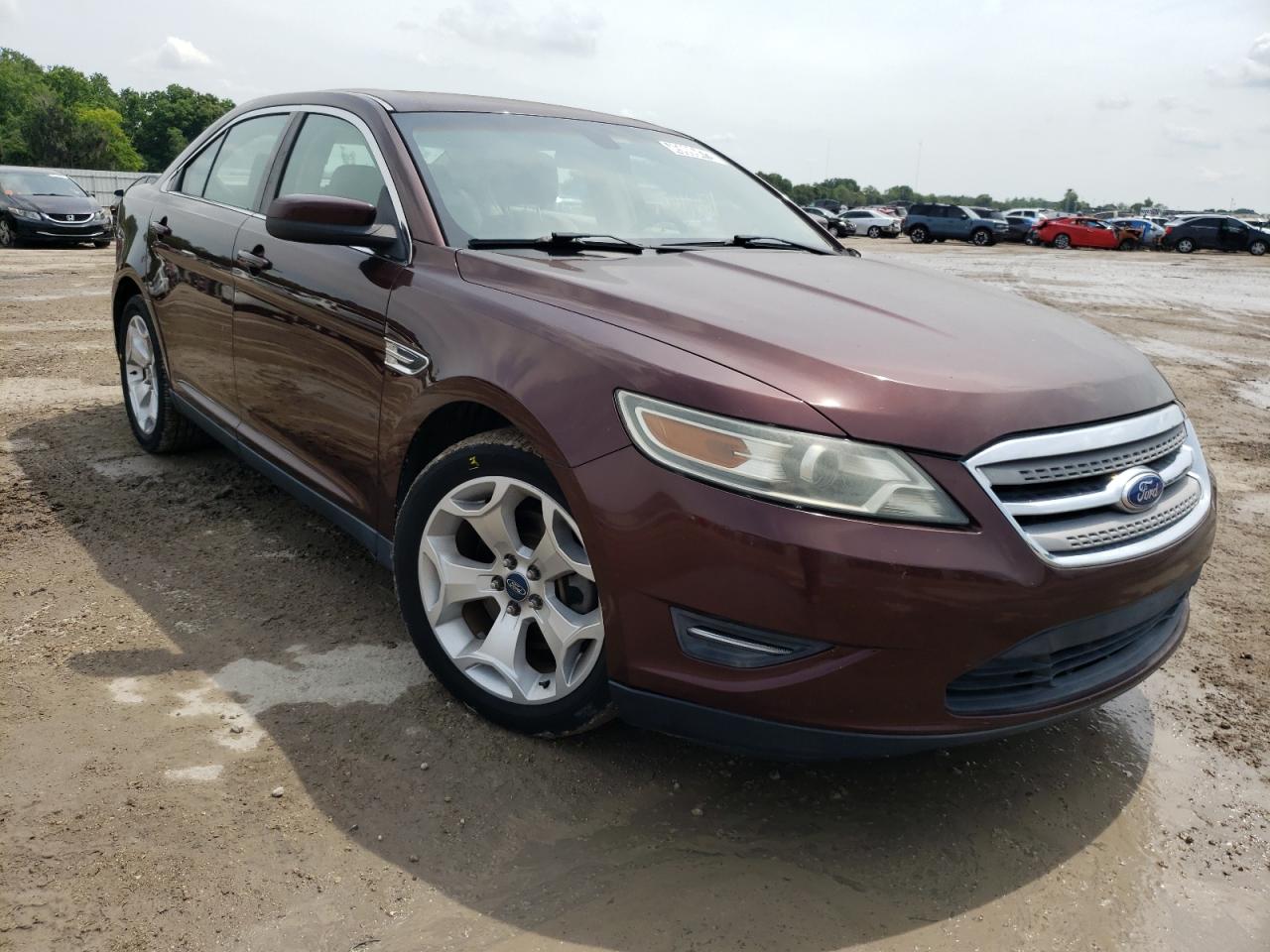 FORD TAURUS SEL 2012 with VIN 1FAHP2HW1CG124315 - Photo from auction
