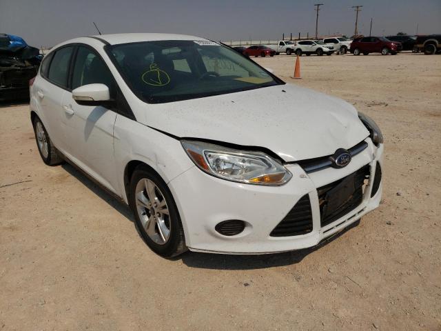 FORD FOCUS SE 2014 with VIN 1FADP3K28EL307702 - Photo from auction