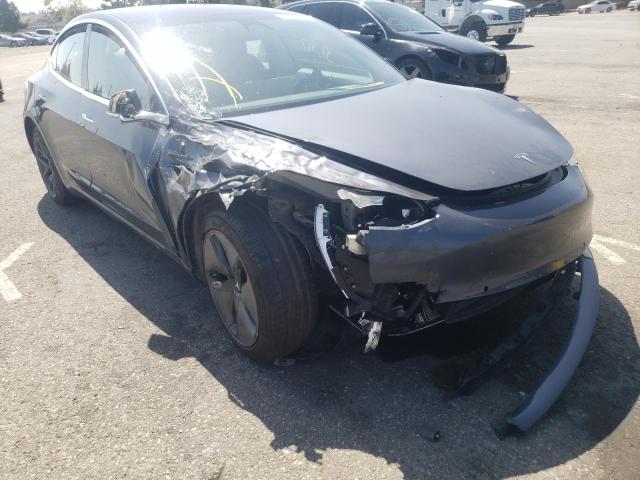 TESLA MODEL 3 2018 with VIN 5YJ3E1EA8JF043297 - Photo from auction