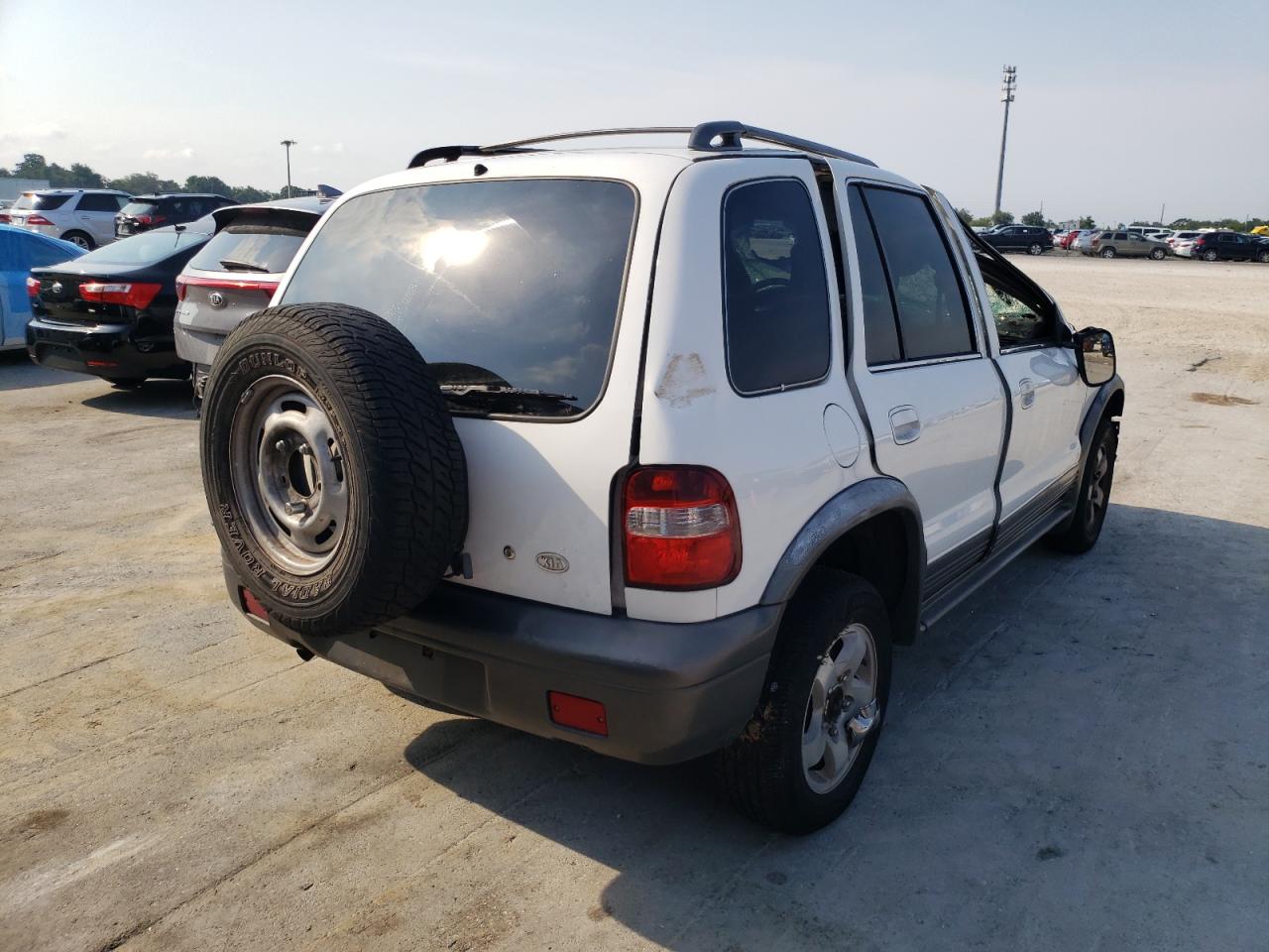 Photo 4 from auction – 2002 KIA SPORTAGE with VIN KNDJB723025158987