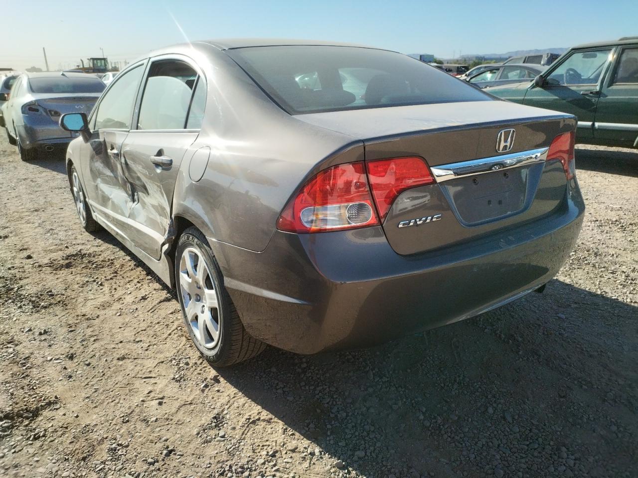 Photo 3 from auction – 2011 HONDA CIVIC LX with VIN 19XFA1F54BE035392