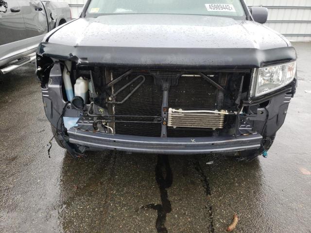 Photo 9 from auction – 2014 HONDA RIDGELINE with VIN 5FPYK1F49EB005100