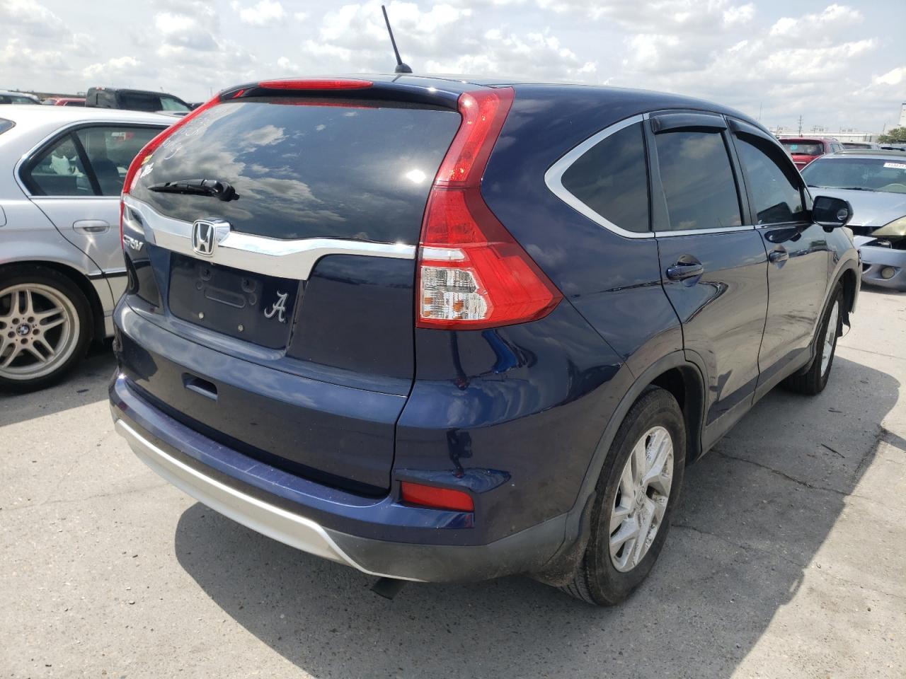 Photo 4 from auction – 2015 HONDA CR-V EX with VIN 2HKRM3H52FH520841