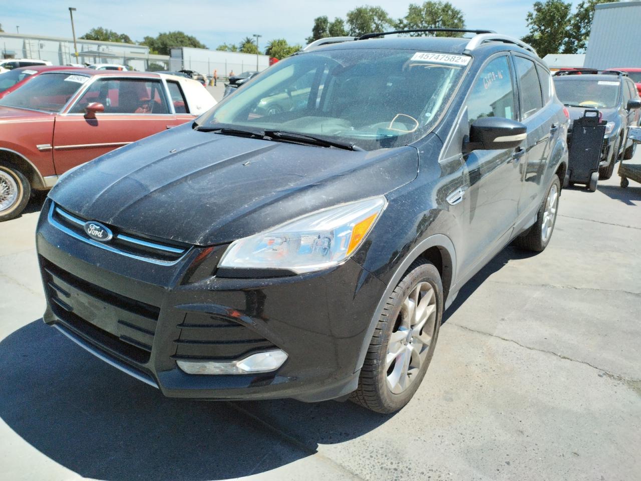 Photo 2 from auction – 2016 FORD ESCAPE TIT with VIN 1FMCU0J96GUC60447