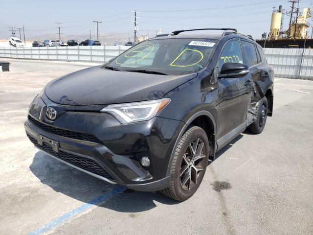 Photo 2 from auction – 2018 TOYOTA RAV4 SE with VIN 2T3NFREV0JW505045