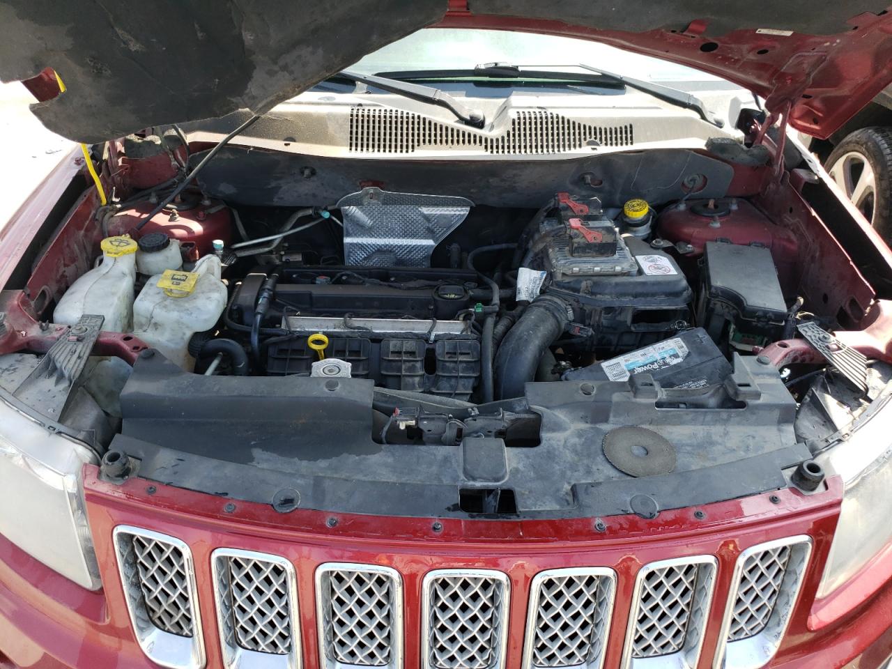 Photo 7 from auction – 2014 JEEP COMPASS LA with VIN 1C4NJCEB1ED707980