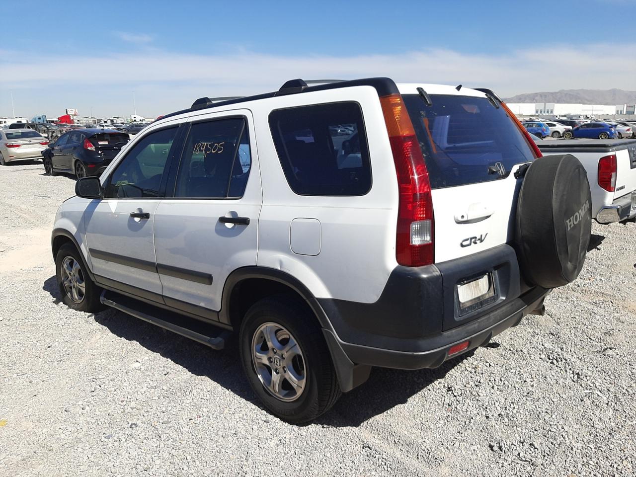 Photo 14 from auction – 2002 HONDA CR-V LX with VIN JHLRD68472C019154
