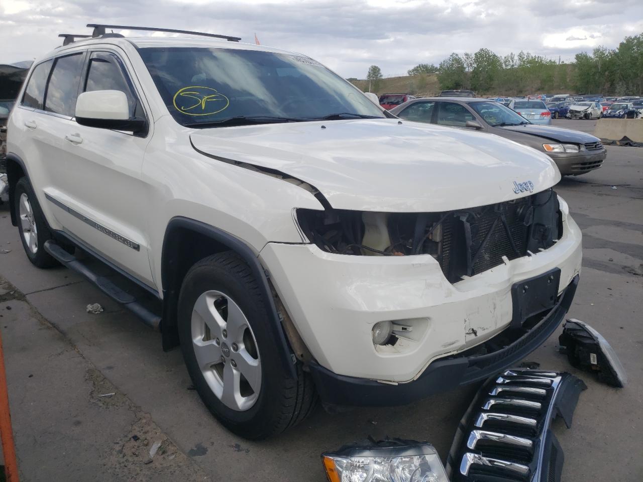 JEEP GRAND CHER 2011 with VIN 1J4RR4GT9BC705556 - Photo from auction
