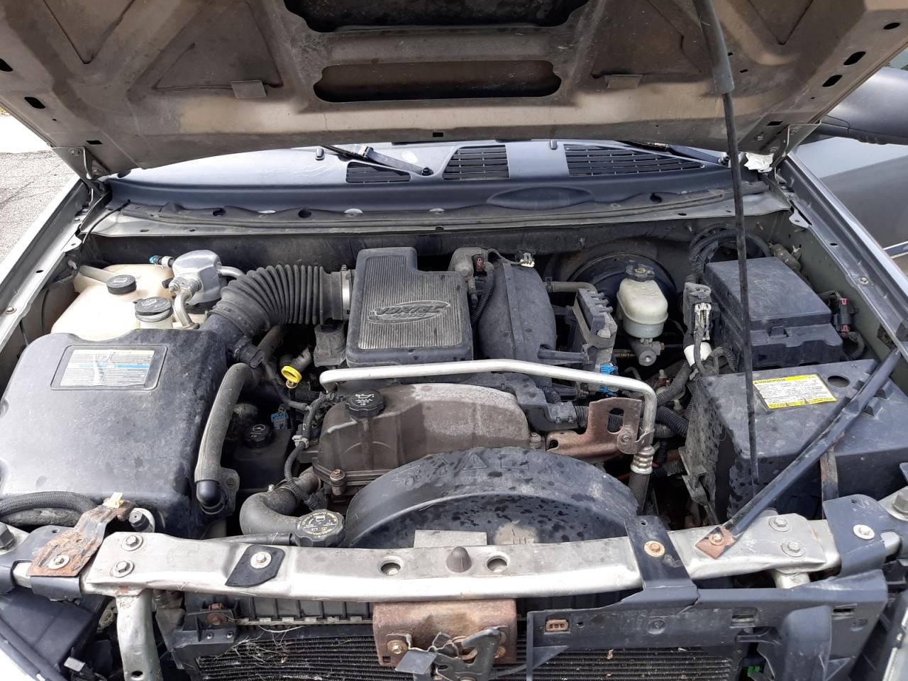 Photo 7 from auction – 2006 GMC ENVOY with VIN 1GKDS13SX62285810