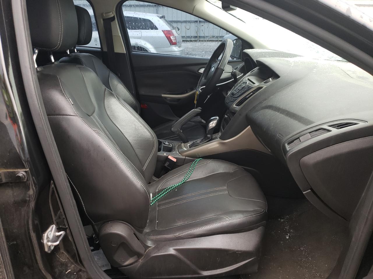 Photo 5 from auction – 2012 FORD FOCUS SEL with VIN 1FAHP3M26CL357168