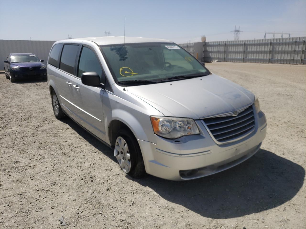 CHRYSLER TOWN & COU 2010 with VIN 2A4RR4DE1AR213681 - Photo from auction