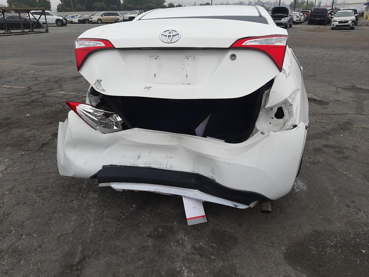 Photo 9 from auction – 2014 TOYOTA COROLLA L with VIN 5YFBURHE6EP109920