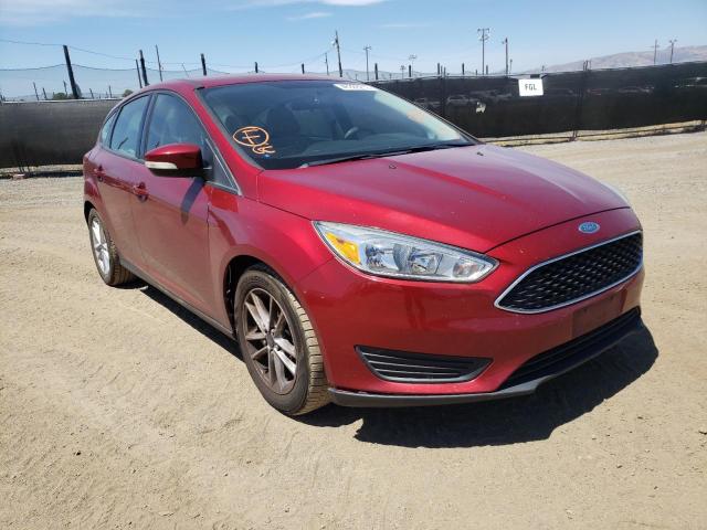 FORD FOCUS SE 2015 with VIN 1FADP3K20FL256729 - Photo from auction