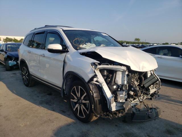 HONDA PILOT TOUR 2020 with VIN 5FNYF6H91LB037071 - Photo from auction