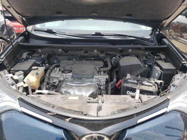 Photo 7 from auction – 2018 TOYOTA RAV4 LE with VIN JTMZFREV9JJ176247