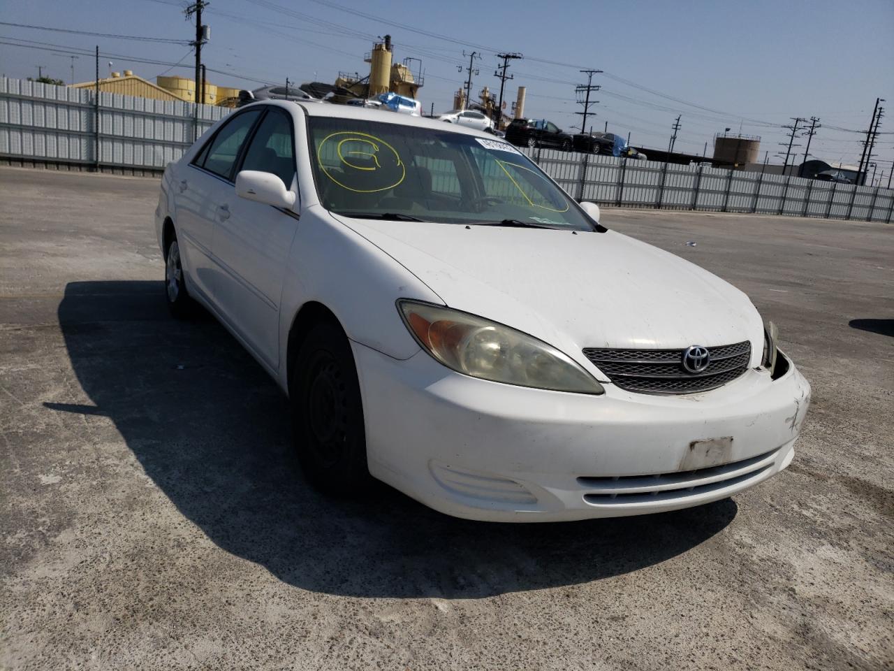 TOYOTA CAMRY LE 2002 with VIN 4T1BE30K42U009661 - Photo from auction