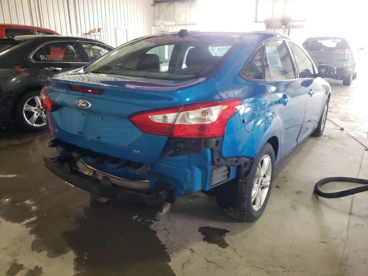 Фото 4 с аукциона – 2014 FORD FOCUS SE с VIN 1FADP3F2XEL402451