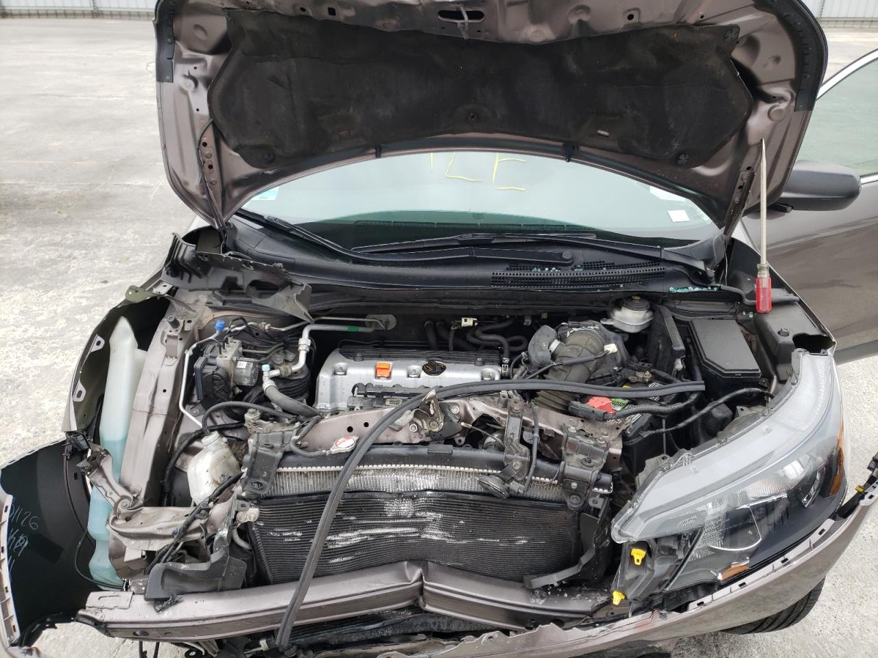 Photo 17 from auction – 2014 HONDA CR-V LX with VIN 2HKRM4H38EH643708