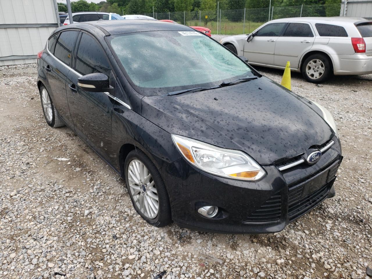 FORD FOCUS SEL 2012 with VIN 1FAHP3M26CL357168 - Photo from auction