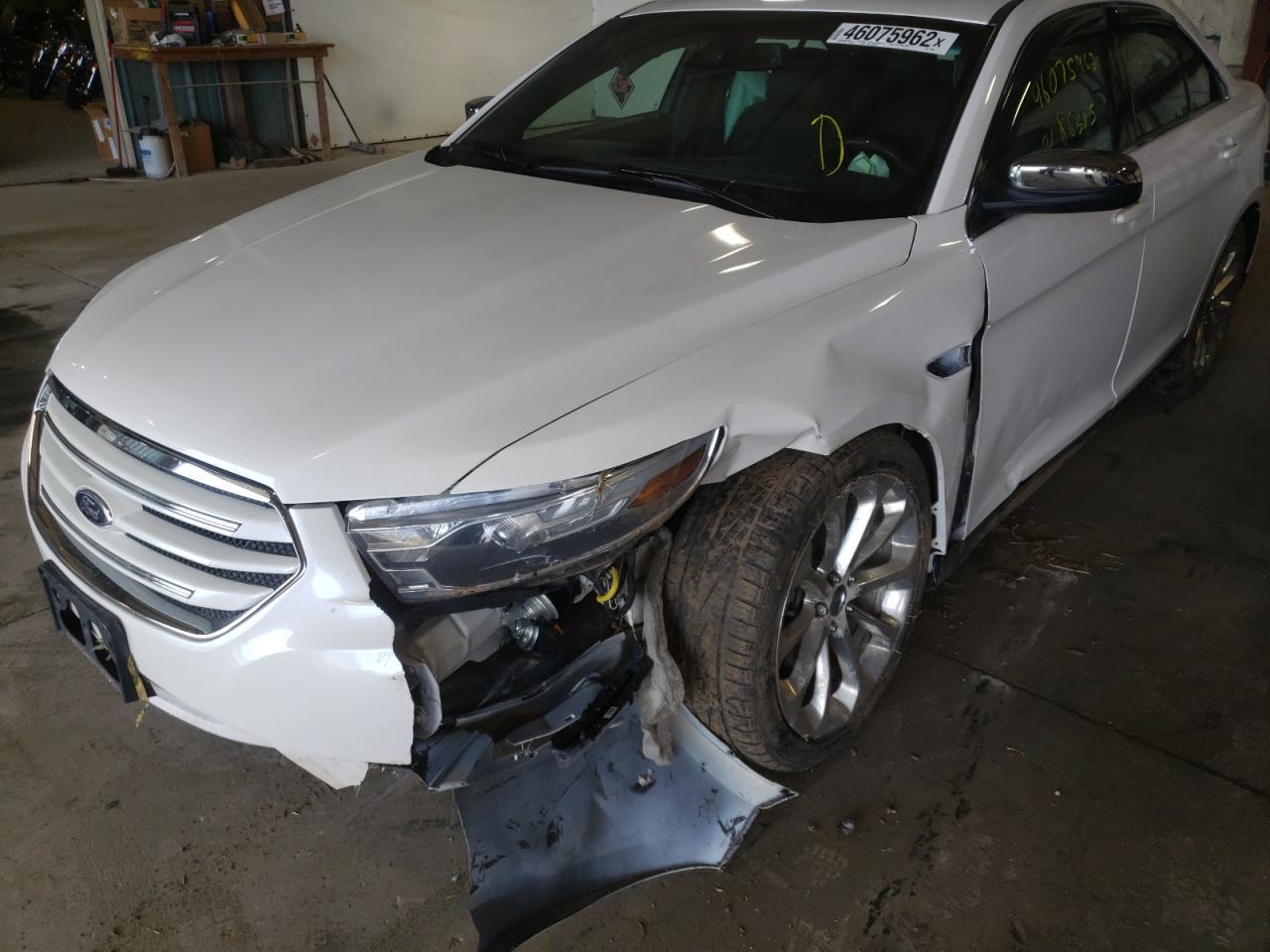 Photo 9 from auction – 2014 FORD TAURUS LIM with VIN 1FAHP2F85EG150097