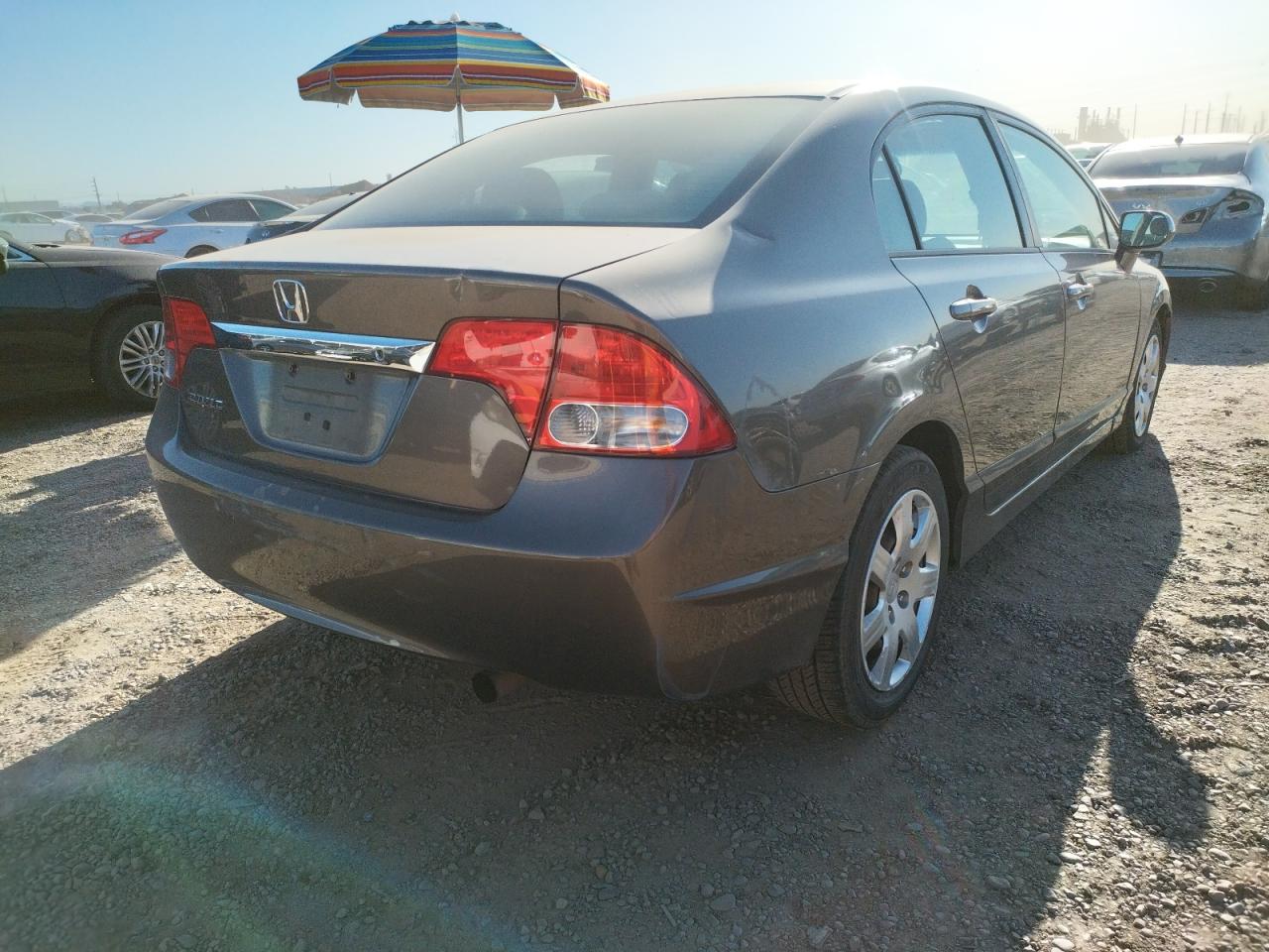 Photo 4 from auction – 2011 HONDA CIVIC LX with VIN 19XFA1F54BE035392