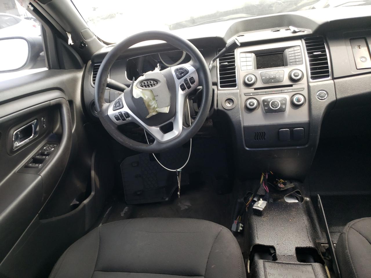 Photo 16 from auction – 2016 FORD TAURUS POL with VIN 1FAHP2MK6GG102447