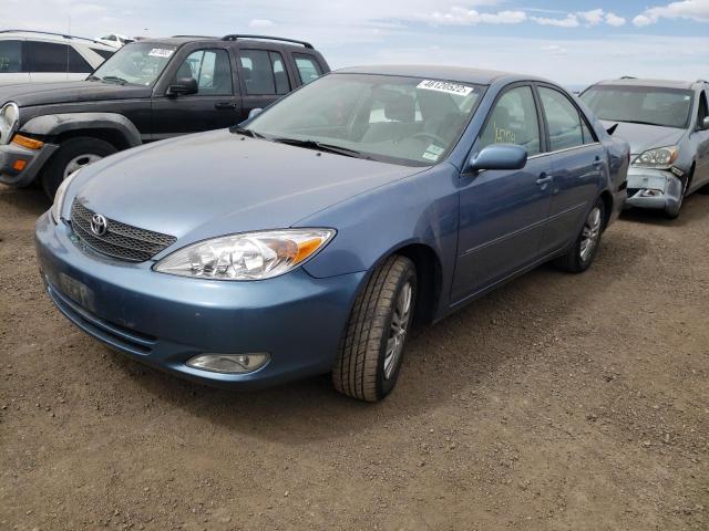 Photo 2 from auction – 2004 TOYOTA CAMRY LE with VIN 4T1BE32K94U871581
