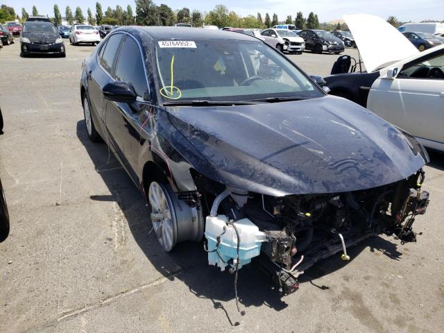 TOYOTA CAMRY LE 2020 with VIN 4T1C11AK2LU889134 - Photo from auction