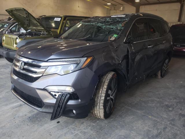 Photo 2 from auction – 2017 HONDA PILOT TOUR with VIN 5FNYF6H96HB095104