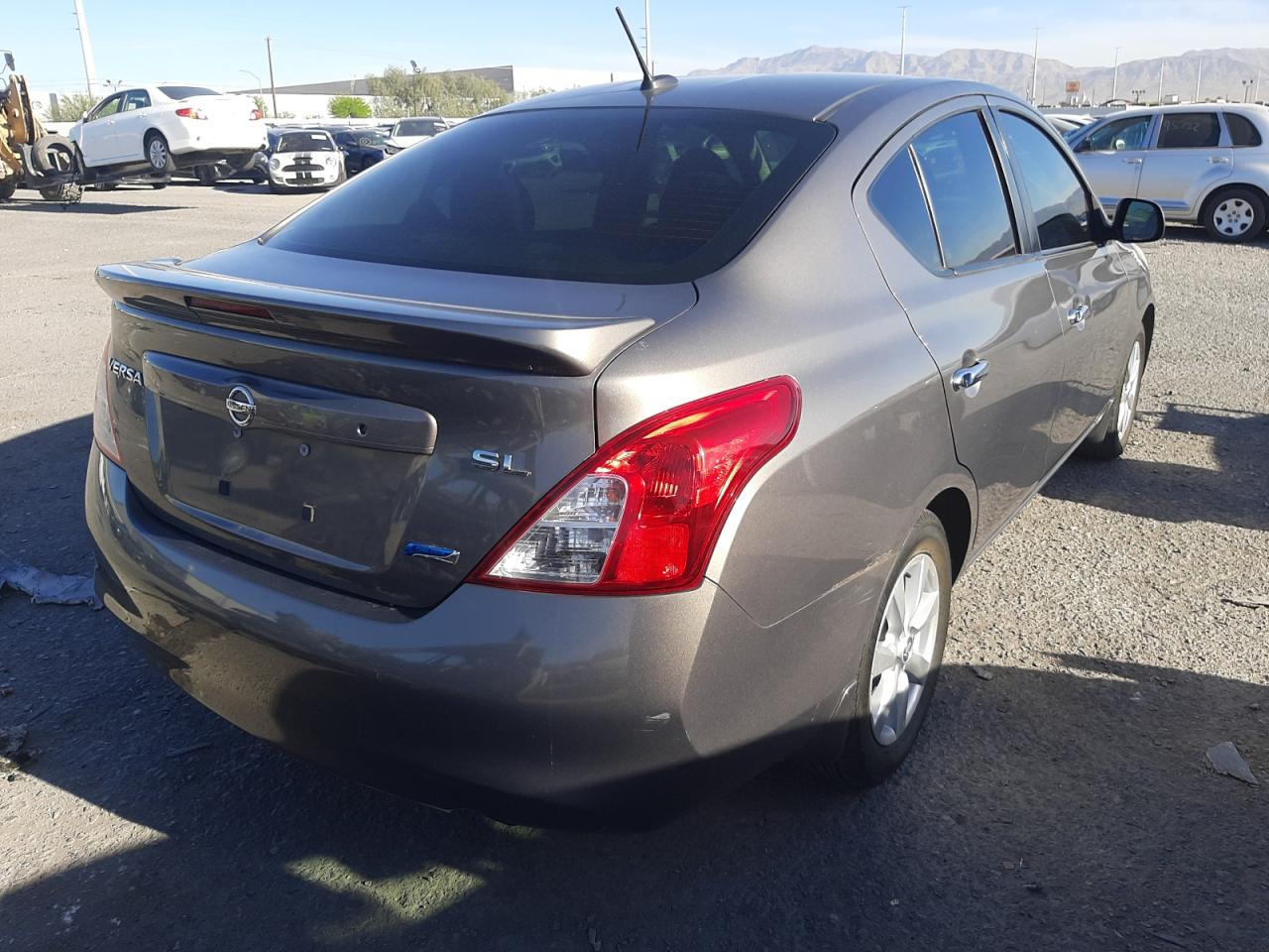 Photo 4 from auction – 2013 NISSAN VERSA S with VIN 3N1CN7AP3DL860554