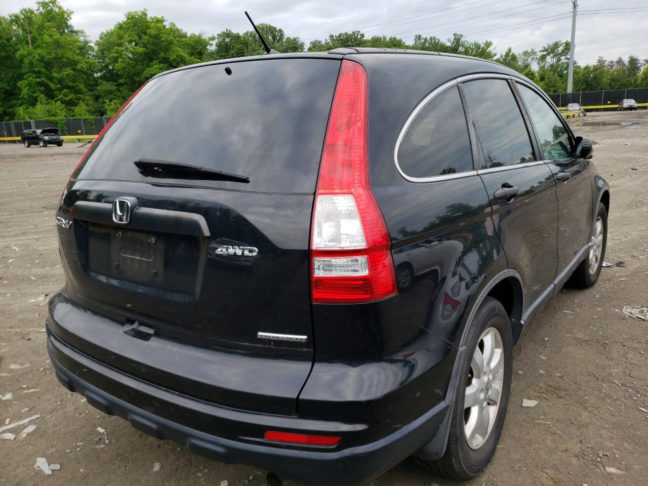 Photo 4 from auction – 2011 HONDA CR-V SE with VIN 5J6RE4H47BL002590